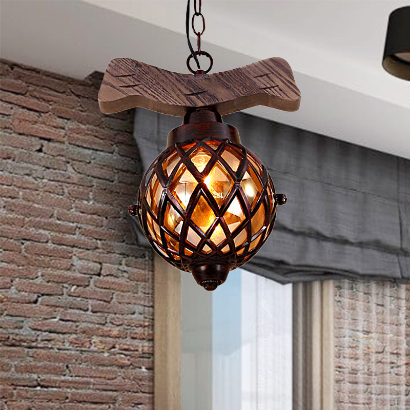Amber Glass Ball Pendant Lamp with Wooden Base 1 Light Country Ceiling Hanging Light in Copper Wood Clearhalo 'Ceiling Lights' 'Industrial Pendants' 'Industrial' 'Middle Century Pendants' 'Pendant Lights' 'Pendants' 'Tiffany' Lighting' 259028