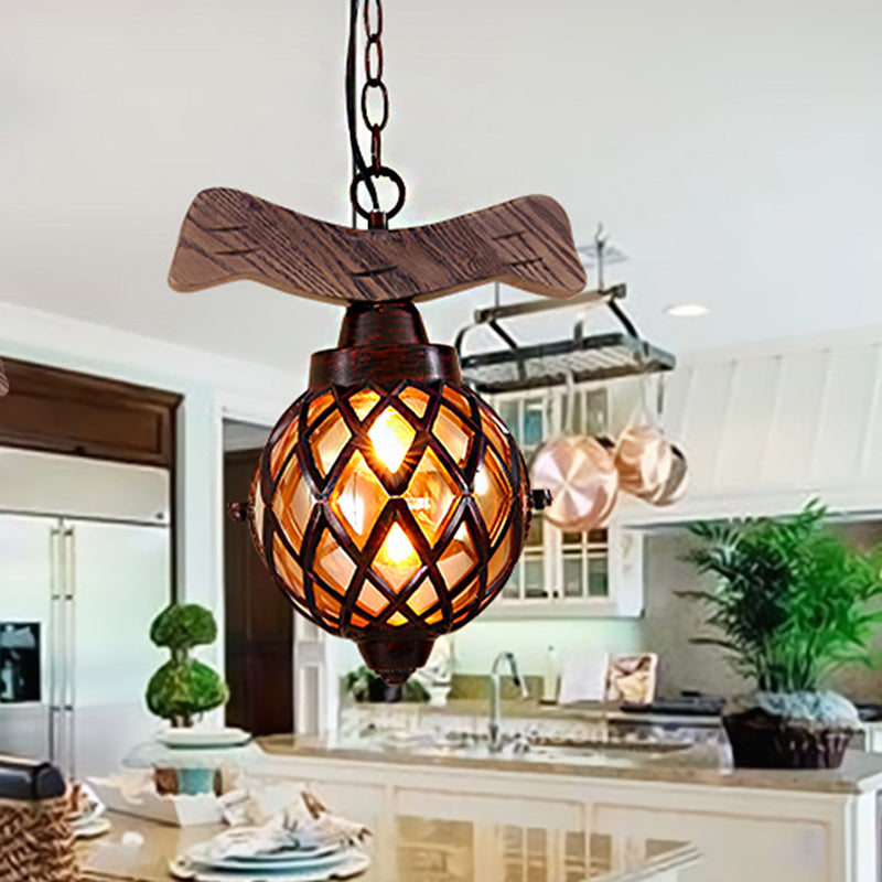 Amber Glass Ball Pendant Lamp with Wooden Base 1 Light Country Ceiling Hanging Light in Copper Clearhalo 'Ceiling Lights' 'Industrial Pendants' 'Industrial' 'Middle Century Pendants' 'Pendant Lights' 'Pendants' 'Tiffany' Lighting' 259029
