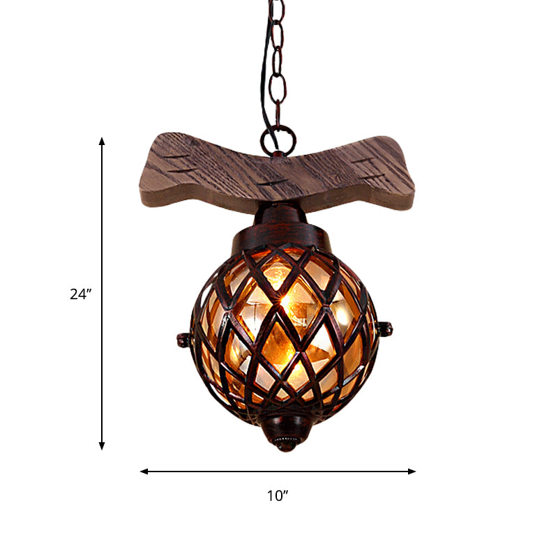 Amber Glass Ball Pendant Lamp with Wooden Base 1 Light Country Ceiling Hanging Light in Copper Clearhalo 'Ceiling Lights' 'Industrial Pendants' 'Industrial' 'Middle Century Pendants' 'Pendant Lights' 'Pendants' 'Tiffany' Lighting' 259031
