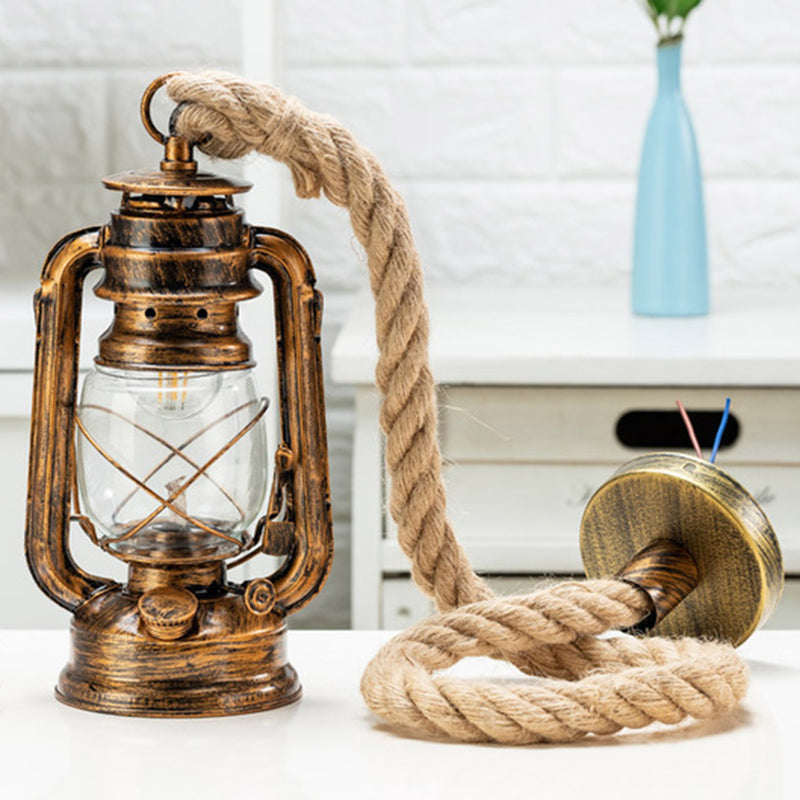 Transparent Glass Kerosene Lantern Ceiling Lamp Nautical 1 Head Bedside Pendant with Hemp Rope Bronze Clearhalo 'Art Deco Pendants' 'Black' 'Cast Iron' 'Ceiling Lights' 'Ceramic' 'Crystal' 'Industrial Pendants' 'Industrial' 'Metal' 'Middle Century Pendants' 'Pendant Lights' 'Pendants' 'Rustic Pendants' 'Tiffany' Lighting' 2592828