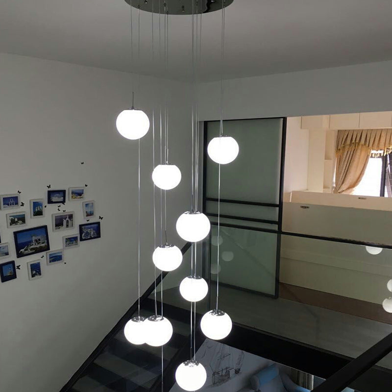 Cream Glass Spherical Multi Pendant Chandelier Simplicity Silver Ceiling Hang Lamp for Lobby Stairs Clearhalo 'Ceiling Lights' 'Modern Pendants' 'Modern' 'Pendant Lights' 'Pendants' Lighting' 2592942