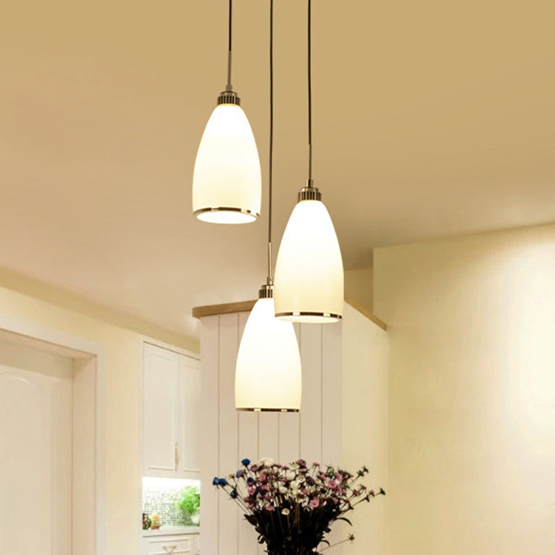 Satin Opal Glass Cluster Bell Pendant Minimalist 3-Light Chrome Suspension Light for Dining Room Clearhalo 'Ceiling Lights' 'Modern Pendants' 'Modern' 'Pendant Lights' 'Pendants' Lighting' 2593013