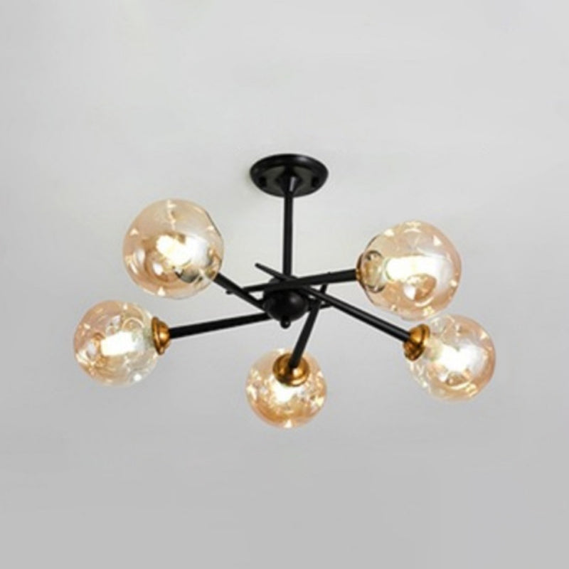 Multi Light Glass Ball Chandelier Light Black Wrought Iron Lamp Body Modern Chic Hanging Light for Living Room 5 Black Amber Clearhalo 'Ceiling Lights' 'Chandeliers' 'Modern Chandeliers' 'Modern' Lighting' 2600526