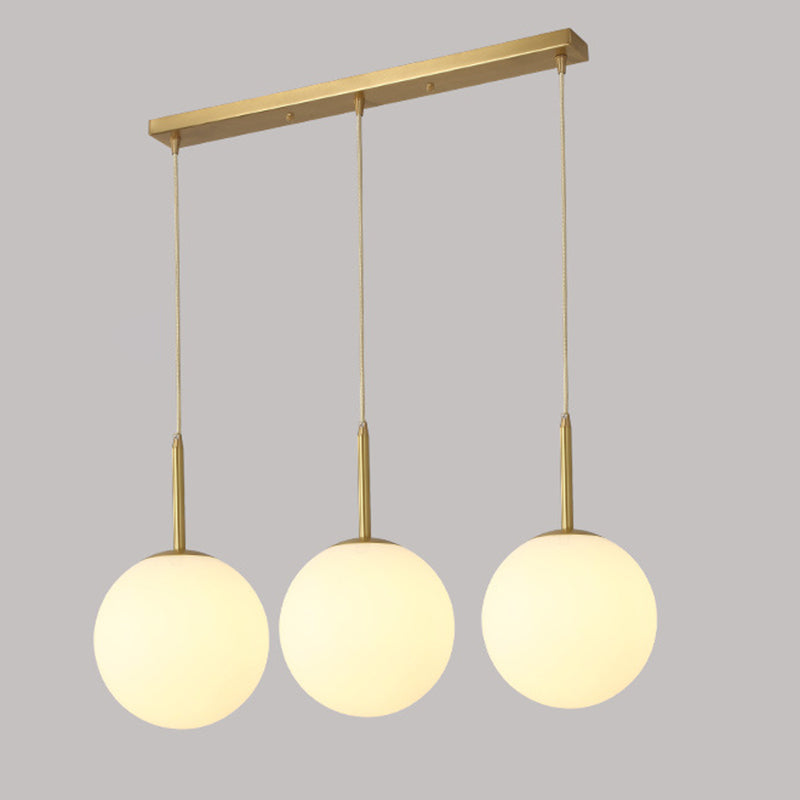 Modern Minimalist Design Hanging Lamp White Globe Glass Shade Pendant Light for Dining Room Table Gold Linear Clearhalo 'Ceiling Lights' 'Pendant Lights' 'Pendants' Lighting' 2610178