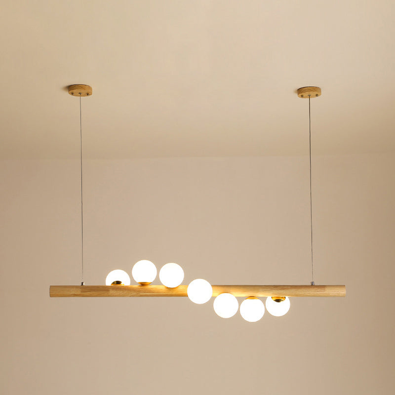 Modern Minimalism Wood Linear Island Pendant Lighting Sphere Glass Island Ceiling Light for Living Room 7 Wood Clearhalo 'Ceiling Lights' 'Island Lights' 'Lighting' 2628685