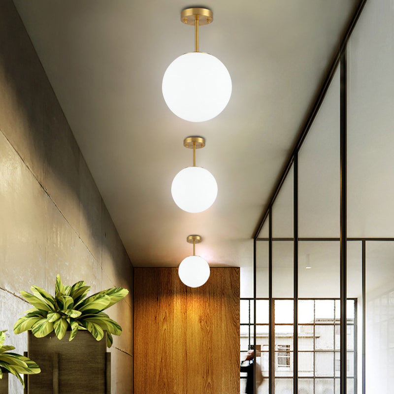 Spherical Hallway Semi Flush Light Fixture White Glass 1 Head Simple Style Ceiling Light in Brass Clearhalo 'Ceiling Lights' 'Close To Ceiling Lights' 'Lighting' 2629533