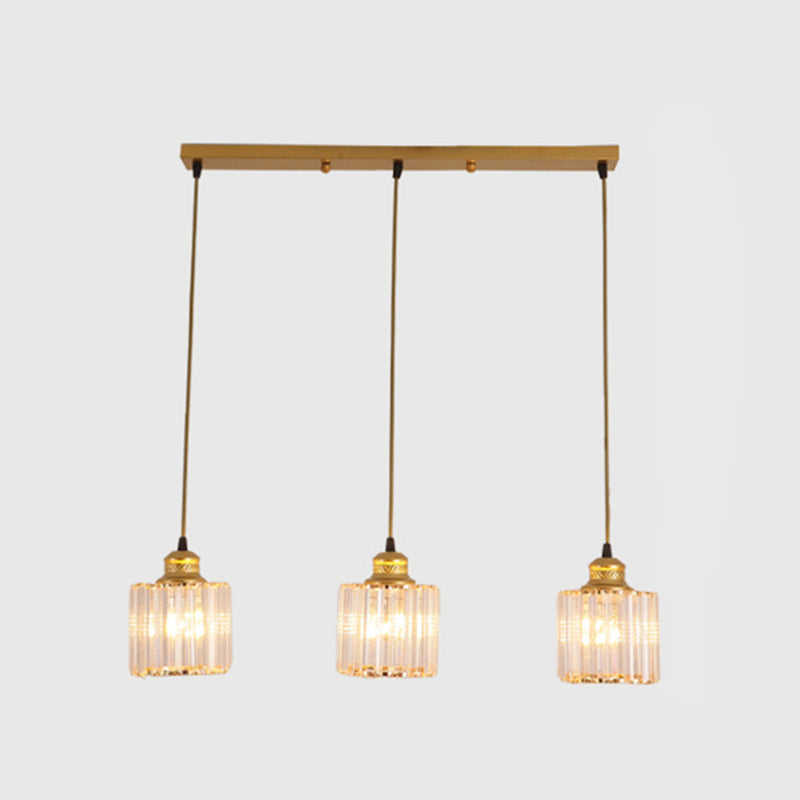 3 Lights Cylinder Multi Hanging Light Fixture Industrial Ribbed Glass Ceiling Light with Hanging Cord for Restaurant Gold Linear Clearhalo 'Ceiling Lights' 'Pendant Lights' 'Pendants' Lighting' 2629935_f3583fe7-73ca-4227-98bf-76abc02fb61f