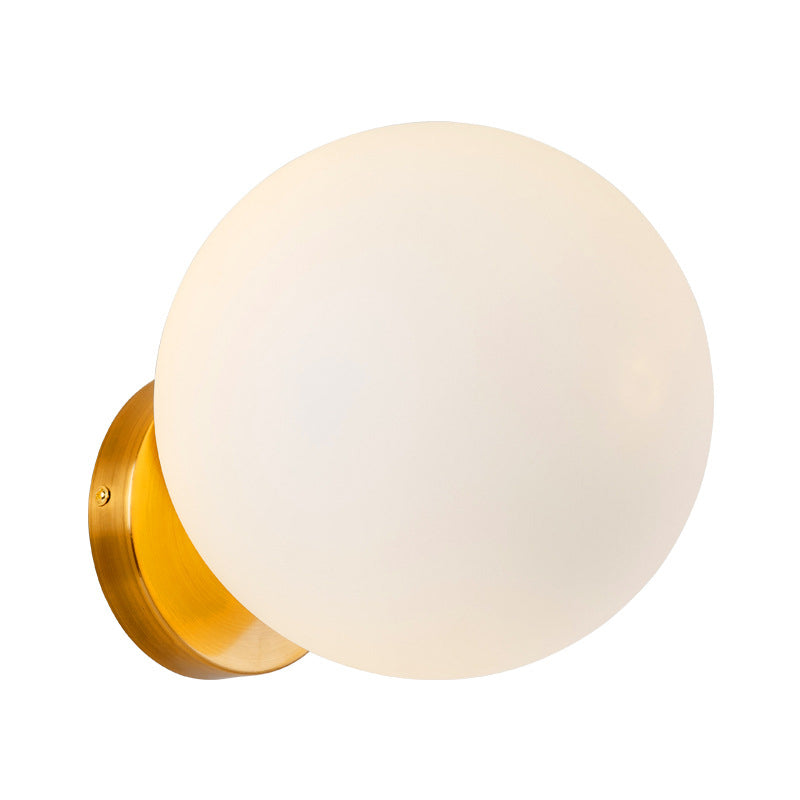 Minimalist 1 Bulb Bedside Sconce Light Matte White Glass Ball Wall Mount Lamp in Gold Clearhalo 'Cast Iron' 'Glass' 'Industrial' 'Modern wall lights' 'Modern' 'Tiffany' 'Traditional wall lights' 'Wall Lamps & Sconces' 'Wall Lights' Lighting' 269621