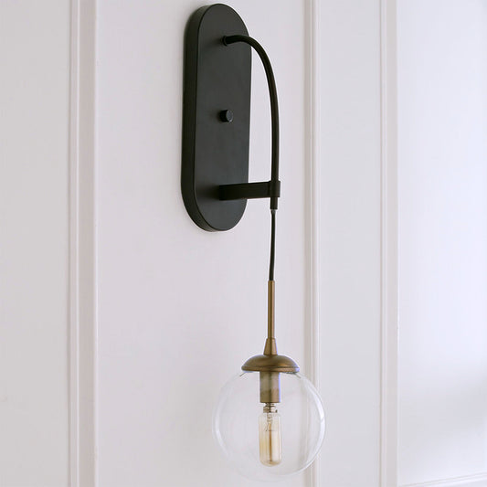 Drop Wall Sconce Minimalist Clear Glass 1 Light Black Wall Mounted Light Fixture Black Clearhalo 'Cast Iron' 'Glass' 'Industrial' 'Modern wall lights' 'Modern' 'Tiffany' 'Traditional wall lights' 'Wall Lamps & Sconces' 'Wall Lights' Lighting' 273256