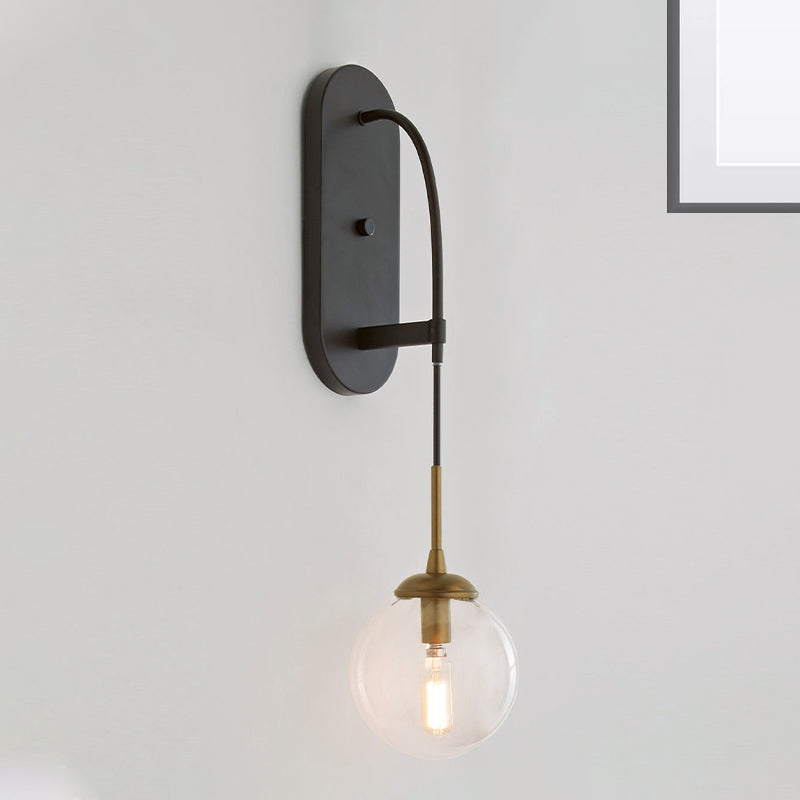 Drop Wall Sconce Minimalist Clear Glass 1 Light Black Wall Mounted Light Fixture Clearhalo 'Cast Iron' 'Glass' 'Industrial' 'Modern wall lights' 'Modern' 'Tiffany' 'Traditional wall lights' 'Wall Lamps & Sconces' 'Wall Lights' Lighting' 273258