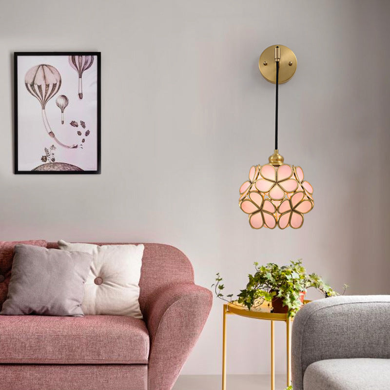 Modernist 1 Bulb Bedside Sconce Light Brass Floral Ball Wall Mount Lamp with Pink/Clear/Light Pink Glass Shade Clearhalo 'Cast Iron' 'Glass' 'Industrial' 'Modern wall lights' 'Modern' 'Tiffany' 'Traditional wall lights' 'Wall Lamps & Sconces' 'Wall Lights' Lighting' 273298