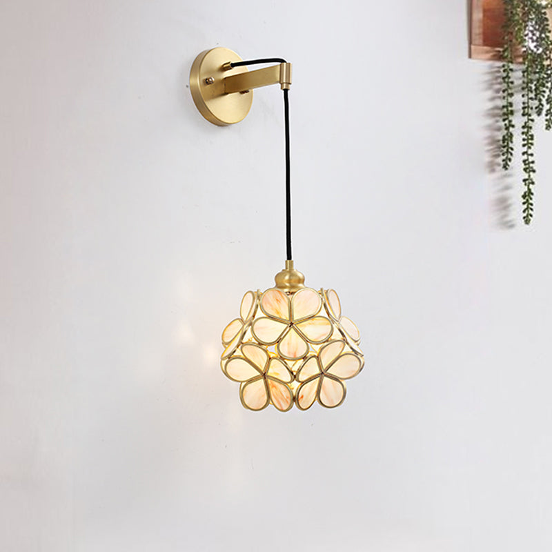 Modernist 1 Bulb Bedside Sconce Light Brass Floral Ball Wall Mount Lamp with Pink/Clear/Light Pink Glass Shade Clearhalo 'Cast Iron' 'Glass' 'Industrial' 'Modern wall lights' 'Modern' 'Tiffany' 'Traditional wall lights' 'Wall Lamps & Sconces' 'Wall Lights' Lighting' 273302