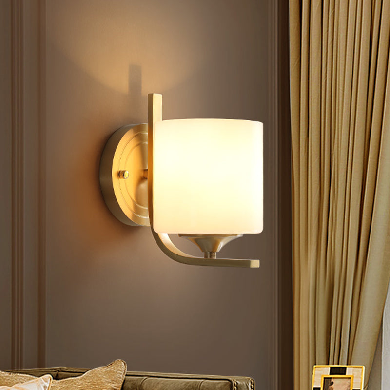 1 Light Drum Shade Wall Sconce Light Modernism Style White Glass Wall Lamp in Brass for Bedroom Clearhalo 'Wall Lamps & Sconces' 'Wall Lights' Lighting' 273828