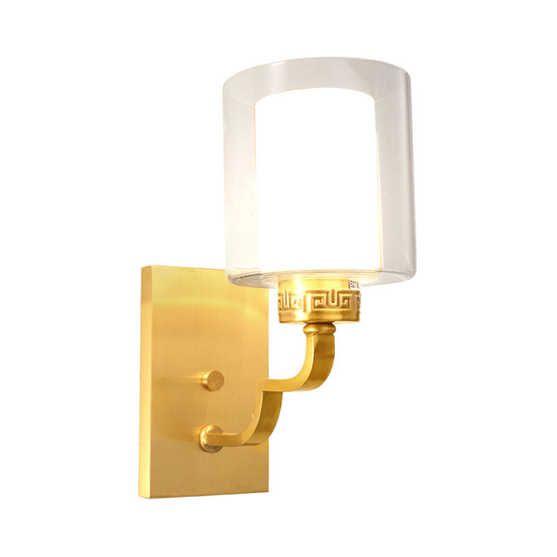 1 Head Wall Lighting with Cylinder Shade Clear and White Glass Modern Style Bedroom Wall Sconce in Brass Clearhalo 'Wall Lamps & Sconces' 'Wall Lights' Lighting' 273842