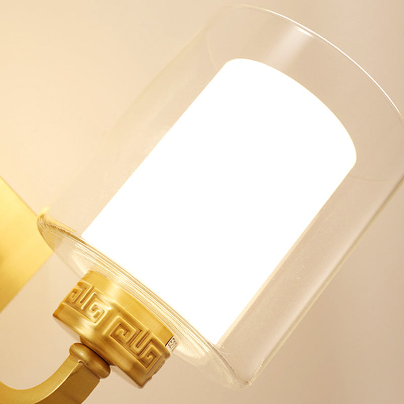 1 Head Wall Lighting with Cylinder Shade Clear and White Glass Modern Style Bedroom Wall Sconce in Brass Clearhalo 'Wall Lamps & Sconces' 'Wall Lights' Lighting' 273844
