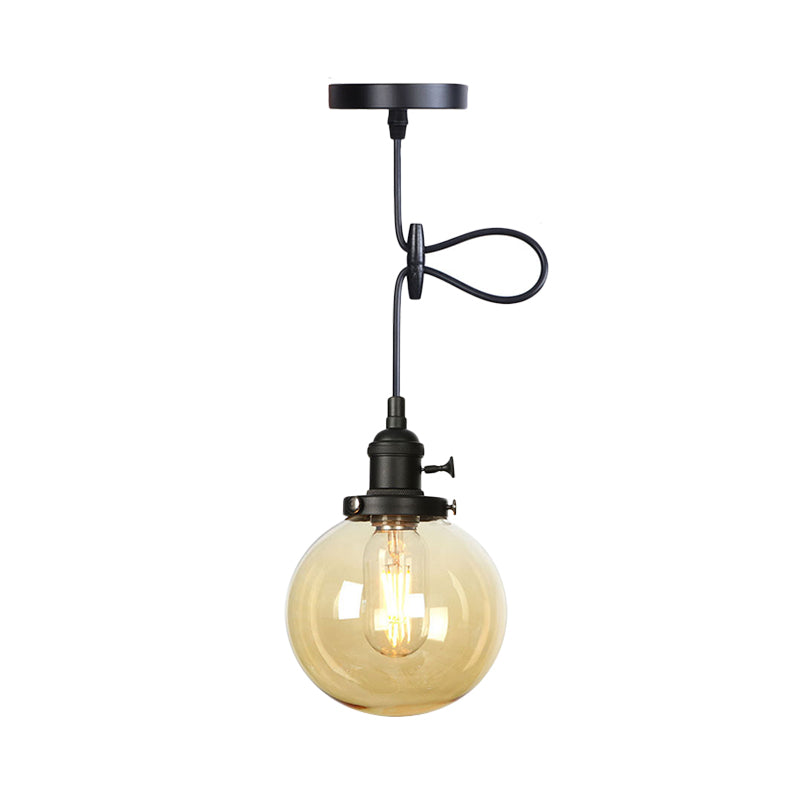 Orbit Hanging Lighting Farmhouse Amber/Clear Glass 1 Bulb Pendant Light Fixture with Adjustable Cord in Black/Bronze/Brass Finish Clearhalo 'Art Deco Pendants' 'Black' 'Cast Iron' 'Ceiling Lights' 'Ceramic' 'Crystal' 'Industrial Pendants' 'Industrial' 'Metal' 'Middle Century Pendants' 'Pendant Lights' 'Pendants' 'Rustic Pendants' 'Tiffany' Lighting' 273935