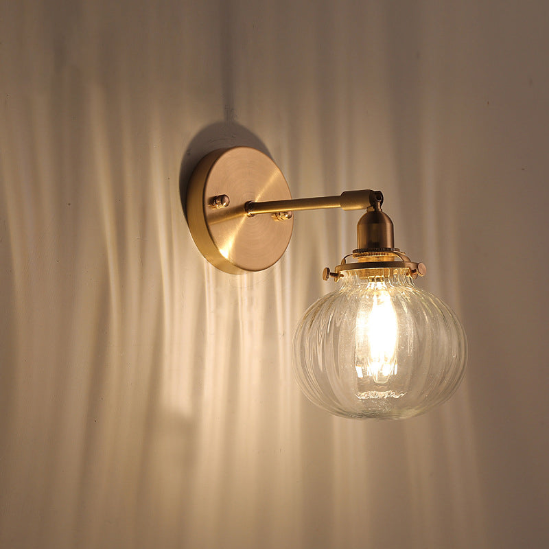 Minimalist Globe Wall Light Champagne/Clear Prismatic Glass Single Sconce Lighting Fixture in Gold Clear Clearhalo 'Cast Iron' 'Glass' 'Industrial' 'Modern wall lights' 'Modern' 'Tiffany' 'Traditional wall lights' 'Wall Lamps & Sconces' 'Wall Lights' Lighting' 273955