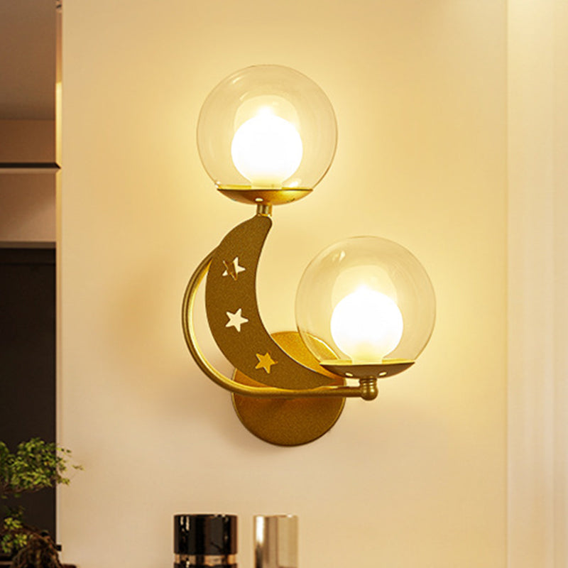 Left/Right Ball Wall Sconce Modern Style 2-Light Clear Glass Wall Mount Lamp Kit in Black/Gold Gold Left Clearhalo 'Cast Iron' 'Glass' 'Industrial' 'Modern wall lights' 'Modern' 'Tiffany' 'Traditional wall lights' 'Wall Lamps & Sconces' 'Wall Lights' Lighting' 274202