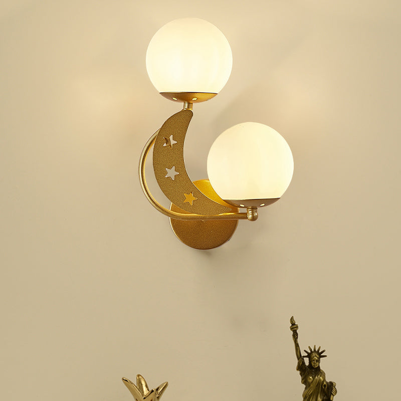 2 Bulbs Bedroom Sconce Light Contemporary Black/Gold Wall Lamp with Left/Right Milky Glass Ball Shade Gold Left Clearhalo 'Cast Iron' 'Glass' 'Industrial' 'Modern wall lights' 'Modern' 'Tiffany' 'Traditional wall lights' 'Wall Lamps & Sconces' 'Wall Lights' Lighting' 274244