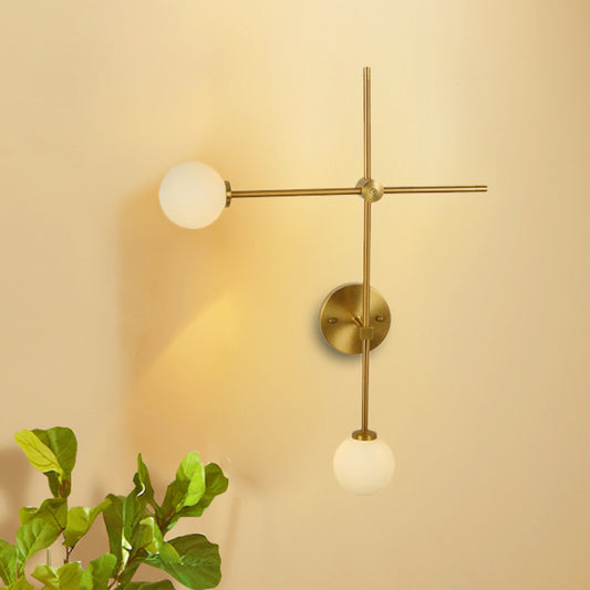 Crossed Wall Mount Lamp Modernist Closed Glass 2-Light Gold Sconce Light Fixture Clearhalo 'Cast Iron' 'Glass' 'Industrial' 'Modern wall lights' 'Modern' 'Tiffany' 'Traditional wall lights' 'Wall Lamps & Sconces' 'Wall Lights' Lighting' 274278