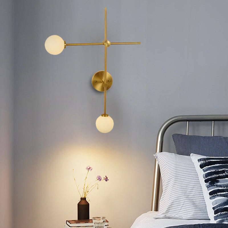 Crossed Wall Mount Lamp Modernist Closed Glass 2-Light Gold Sconce Light Fixture Clearhalo 'Cast Iron' 'Glass' 'Industrial' 'Modern wall lights' 'Modern' 'Tiffany' 'Traditional wall lights' 'Wall Lamps & Sconces' 'Wall Lights' Lighting' 274279