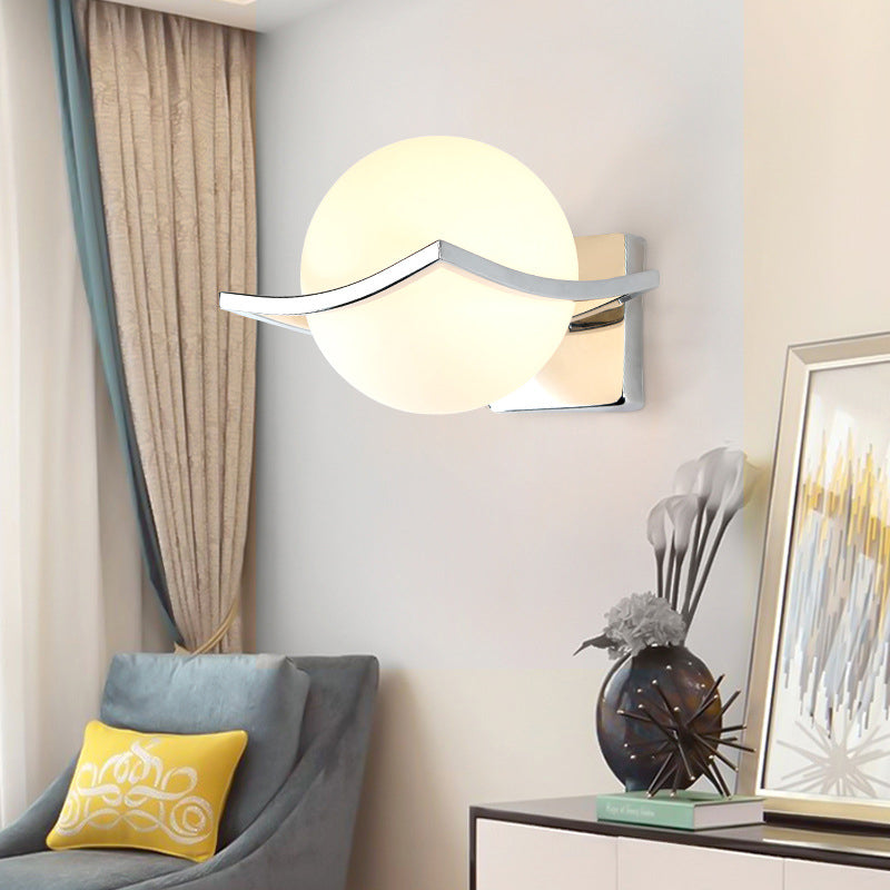 Globe Bedroom Wall Sconce Light Matte White Glass 1 Bulb Minimalist Wall Mount Lamp in Chrome Box Clearhalo 'Cast Iron' 'Glass' 'Industrial' 'Modern wall lights' 'Modern' 'Tiffany' 'Traditional wall lights' 'Wall Lamps & Sconces' 'Wall Lights' Lighting' 274284