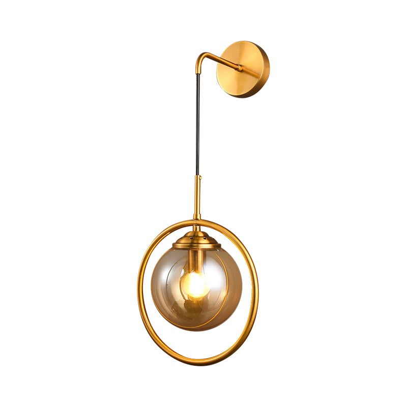 Orbit Smoke Gray/Clear/Amber Glass Wall Lamp Contemporary Single Brass Finish Sconce Light Fixture Clearhalo 'Cast Iron' 'Glass' 'Industrial' 'Modern wall lights' 'Modern' 'Tiffany' 'Traditional wall lights' 'Wall Lamps & Sconces' 'Wall Lights' Lighting' 274467