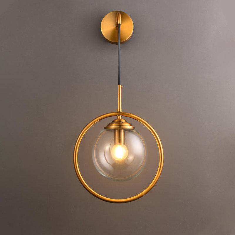 Orbit Smoke Gray/Clear/Amber Glass Wall Lamp Contemporary Single Brass Finish Sconce Light Fixture Clear Clearhalo 'Cast Iron' 'Glass' 'Industrial' 'Modern wall lights' 'Modern' 'Tiffany' 'Traditional wall lights' 'Wall Lamps & Sconces' 'Wall Lights' Lighting' 274469