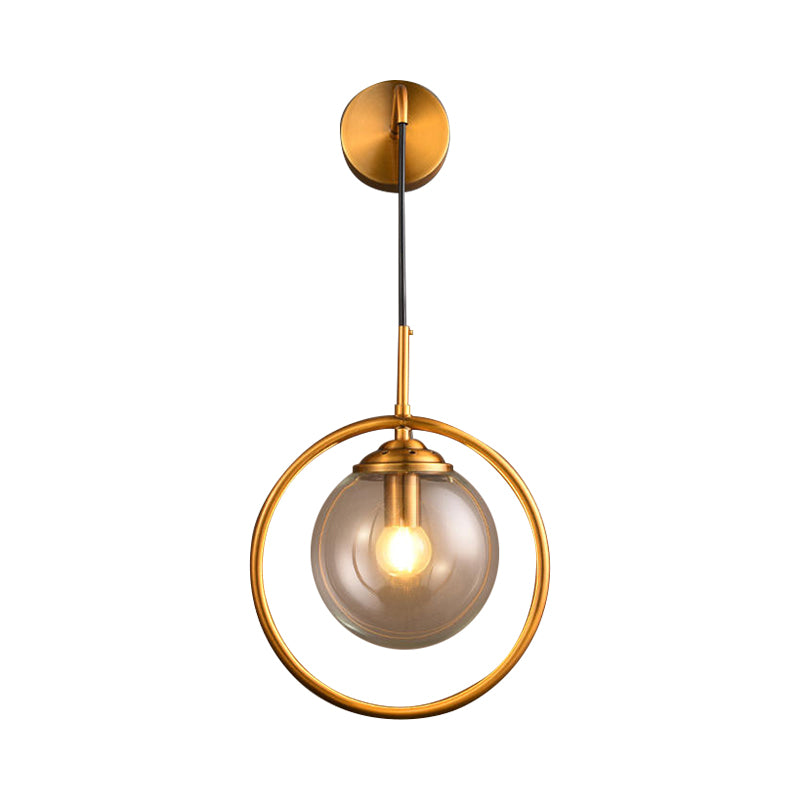 Orbit Smoke Gray/Clear/Amber Glass Wall Lamp Contemporary Single Brass Finish Sconce Light Fixture Clearhalo 'Cast Iron' 'Glass' 'Industrial' 'Modern wall lights' 'Modern' 'Tiffany' 'Traditional wall lights' 'Wall Lamps & Sconces' 'Wall Lights' Lighting' 274471