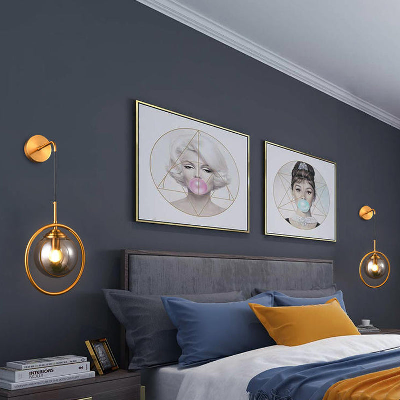 Orbit Smoke Gray/Clear/Amber Glass Wall Lamp Contemporary Single Brass Finish Sconce Light Fixture Clearhalo 'Cast Iron' 'Glass' 'Industrial' 'Modern wall lights' 'Modern' 'Tiffany' 'Traditional wall lights' 'Wall Lamps & Sconces' 'Wall Lights' Lighting' 274474