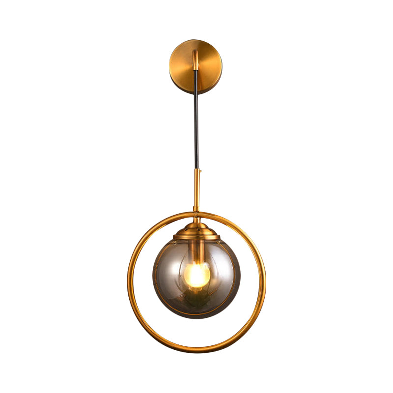 Orbit Smoke Gray/Clear/Amber Glass Wall Lamp Contemporary Single Brass Finish Sconce Light Fixture Clearhalo 'Cast Iron' 'Glass' 'Industrial' 'Modern wall lights' 'Modern' 'Tiffany' 'Traditional wall lights' 'Wall Lamps & Sconces' 'Wall Lights' Lighting' 274475