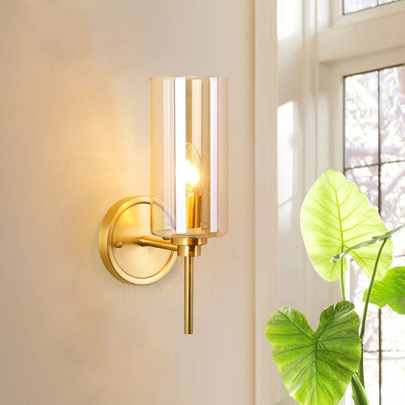 Modern Cylinder Sconce Light Clear Glass Single Bulb Brass Finish Wall Mounted Lamp Clearhalo 'Cast Iron' 'Glass' 'Industrial' 'Modern wall lights' 'Modern' 'Tiffany' 'Traditional wall lights' 'Wall Lamps & Sconces' 'Wall Lights' Lighting' 274581