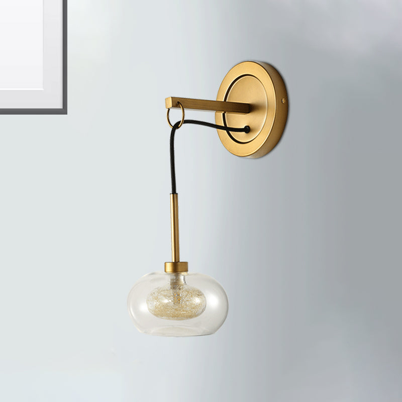 Oval Amber/White Glass Sconce Modernist 1 Light Brass Finish Wall Mounted Drop Lamp Clearhalo 'Cast Iron' 'Glass' 'Industrial' 'Modern wall lights' 'Modern' 'Tiffany' 'Traditional wall lights' 'Wall Lamps & Sconces' 'Wall Lights' Lighting' 274884