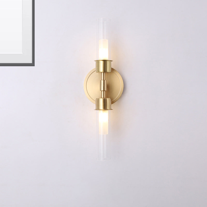 Modern Double Cylinder Wall Mount Light Clear Glass 2 Lights Brass Finish Wall Sconce Clearhalo 'Cast Iron' 'Glass' 'Industrial' 'Modern wall lights' 'Modern' 'Tiffany' 'Traditional wall lights' 'Wall Lamps & Sconces' 'Wall Lights' Lighting' 274922