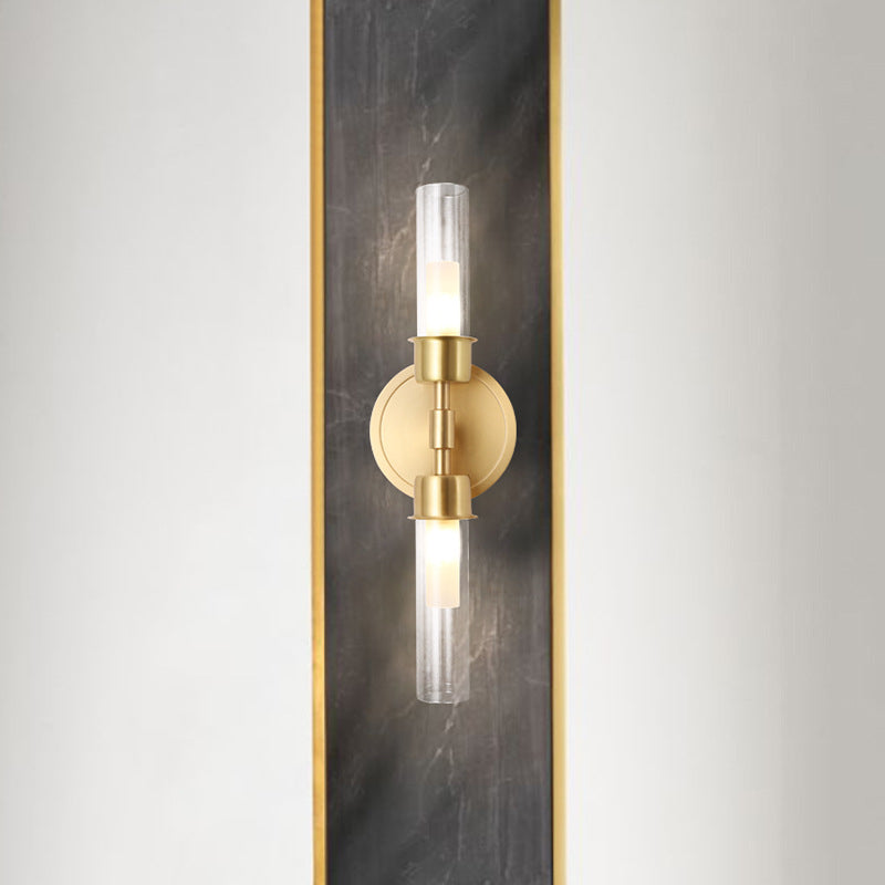 Modern Double Cylinder Wall Mount Light Clear Glass 2 Lights Brass Finish Wall Sconce Clearhalo 'Cast Iron' 'Glass' 'Industrial' 'Modern wall lights' 'Modern' 'Tiffany' 'Traditional wall lights' 'Wall Lamps & Sconces' 'Wall Lights' Lighting' 274923
