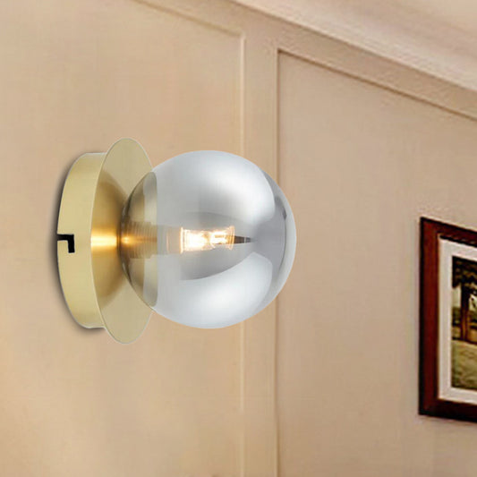 Single Bedroom Wall Sconce Light Simplicity Golden Wall Light Fixture with Smoke Grey Sphere Glass Shade Gold Clearhalo 'Cast Iron' 'Glass' 'Industrial' 'Modern wall lights' 'Modern' 'Tiffany' 'Traditional wall lights' 'Wall Lamps & Sconces' 'Wall Lights' Lighting' 274986