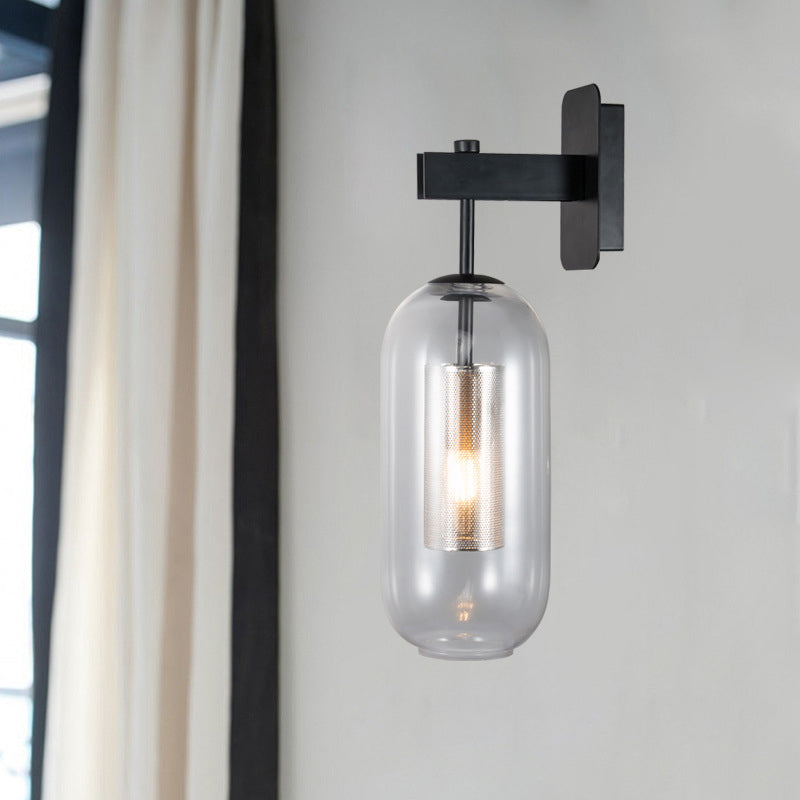 Black Pill Shape Wall Light Modern Single Light Translucent Glass Wall Light Sconce Black Clearhalo 'Cast Iron' 'Glass' 'Industrial' 'Modern wall lights' 'Modern' 'Tiffany' 'Traditional wall lights' 'Wall Lamps & Sconces' 'Wall Lights' Lighting' 275052