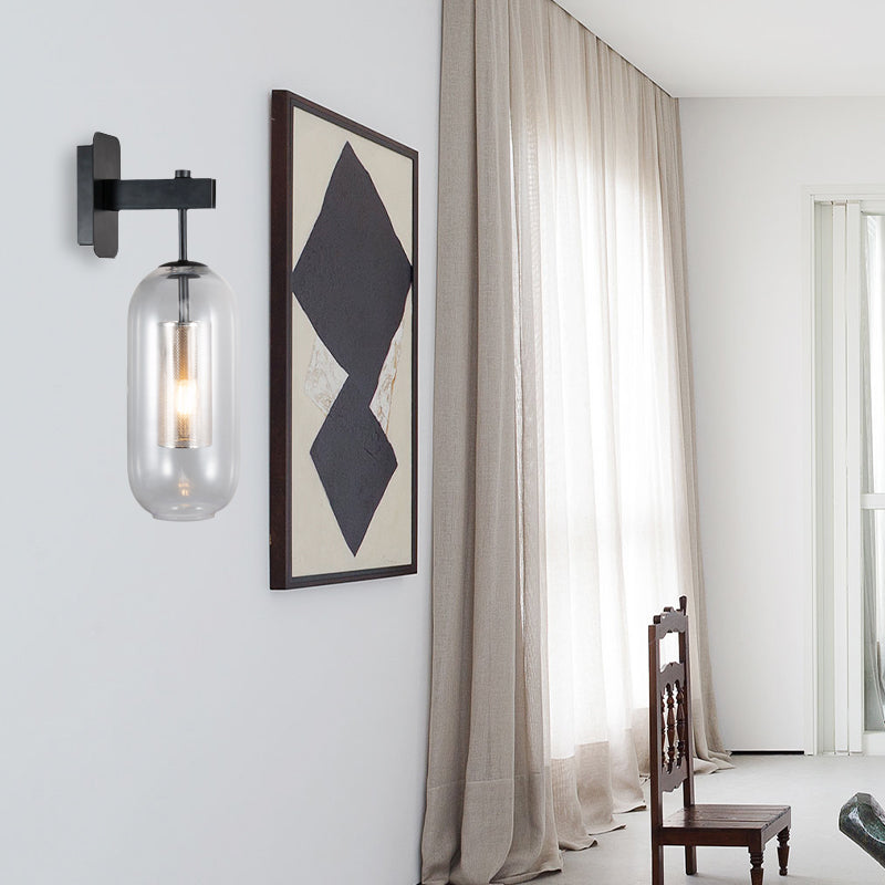 Black Pill Shape Wall Light Modern Single Light Translucent Glass Wall Light Sconce Clearhalo 'Cast Iron' 'Glass' 'Industrial' 'Modern wall lights' 'Modern' 'Tiffany' 'Traditional wall lights' 'Wall Lamps & Sconces' 'Wall Lights' Lighting' 275054