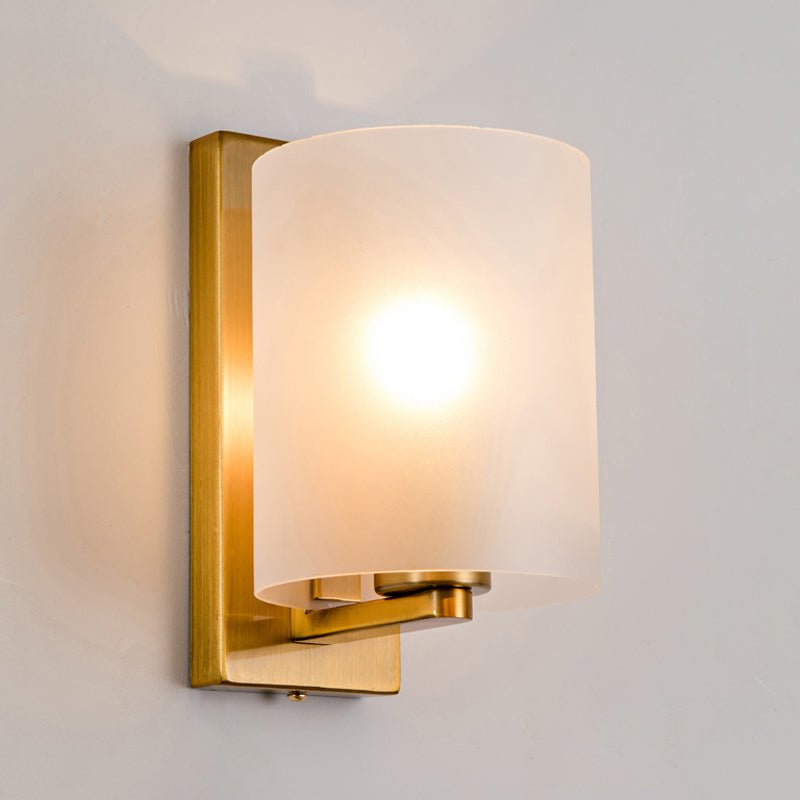 Cylindric Wall Light Sconce Post Modern Clear/Textured White Glass 1 Bulb Brass Finish Wall Lamp Clearhalo 'Cast Iron' 'Glass' 'Industrial' 'Modern wall lights' 'Modern' 'Tiffany' 'Traditional wall lights' 'Wall Lamps & Sconces' 'Wall Lights' Lighting' 275624
