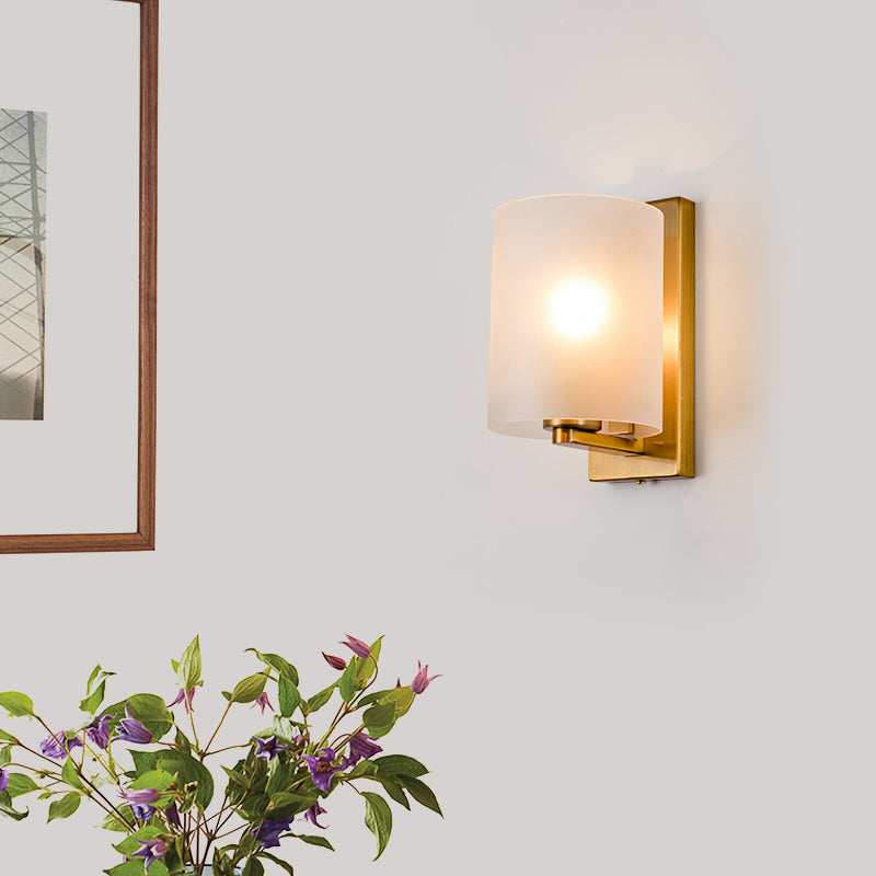 Cylindric Wall Light Sconce Post Modern Clear/Textured White Glass 1 Bulb Brass Finish Wall Lamp Clearhalo 'Cast Iron' 'Glass' 'Industrial' 'Modern wall lights' 'Modern' 'Tiffany' 'Traditional wall lights' 'Wall Lamps & Sconces' 'Wall Lights' Lighting' 275626