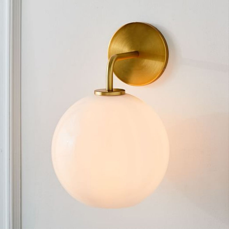 Clear/White Glass Orb Sconce Light Post Modern Single Light Wall Sconce with Brass Arm Clearhalo 'Cast Iron' 'Glass' 'Industrial' 'Modern wall lights' 'Modern' 'Tiffany' 'Traditional wall lights' 'Wall Lamps & Sconces' 'Wall Lights' Lighting' 275696