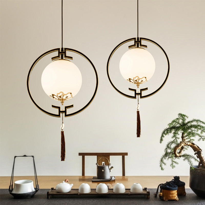 1 Light Pendulum Light Classic Globe Cream Glass Suspension Lamp in Black with Metal Ring Clearhalo 'Ceiling Lights' 'Pendant Lights' 'Pendants' Lighting' 286132