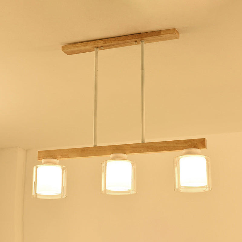 Nordic Linear Island Light Wood 3/4 Heads Dining Room Hanging Lamp with Cylinder White Glass Shade Inside Clearhalo 'Ceiling Lights' 'Chandeliers' 'Glass shade' 'Glass' 'Island Lights' Lighting' 288652
