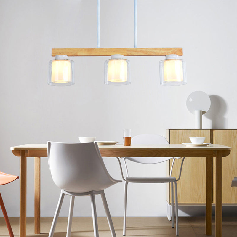 Nordic Linear Island Light Wood 3/4 Heads Dining Room Hanging Lamp with Cylinder White Glass Shade Inside Clearhalo 'Ceiling Lights' 'Chandeliers' 'Glass shade' 'Glass' 'Island Lights' Lighting' 288653