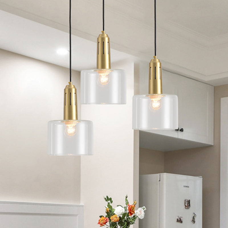 1 Light Dining Room Hanging Light Postmodern Brass Pendant Lamp with Cylinder Clear Glass Shade Clearhalo 'Ceiling Lights' 'Modern Pendants' 'Modern' 'Pendant Lights' 'Pendants' Lighting' 288822