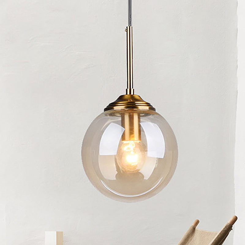 Contemporary Globe Hanging Light Amber/Clear/Smoke Gray Glass 1 Head Bedroom Pendant Light Fixture Amber Clearhalo 'Ceiling Lights' 'Modern Pendants' 'Modern' 'Pendant Lights' 'Pendants' Lighting' 288958