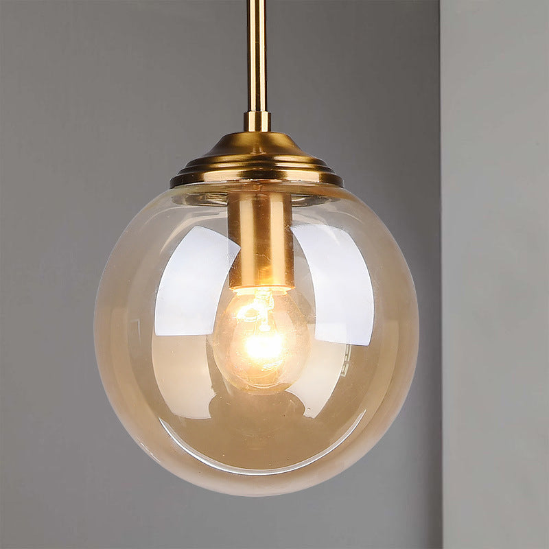 Contemporary Globe Hanging Light Amber/Clear/Smoke Gray Glass 1 Head Bedroom Pendant Light Fixture Clearhalo 'Ceiling Lights' 'Modern Pendants' 'Modern' 'Pendant Lights' 'Pendants' Lighting' 288959