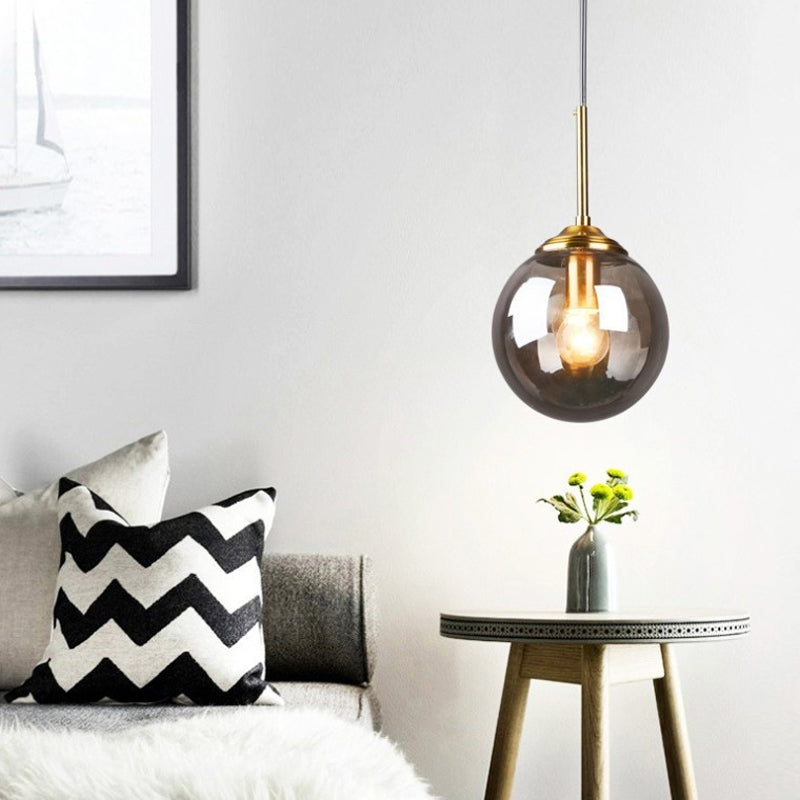 Contemporary Globe Hanging Light Amber/Clear/Smoke Gray Glass 1 Head Bedroom Pendant Light Fixture Clearhalo 'Ceiling Lights' 'Modern Pendants' 'Modern' 'Pendant Lights' 'Pendants' Lighting' 288973