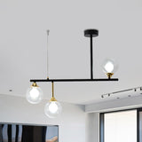 3 Bulbs Globe Island Lighting Modernism Clear Glass Pendant Light Fixture in Black for Dining Room Clearhalo 'Ceiling Lights' 'Close To Ceiling Lights' 'Glass shade' 'Glass' 'Island Lights' Lighting' 289213