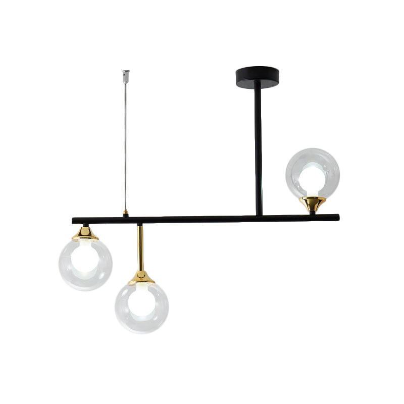 3 Bulbs Globe Island Lighting Modernism Clear Glass Pendant Light Fixture in Black for Dining Room Clearhalo 'Ceiling Lights' 'Close To Ceiling Lights' 'Glass shade' 'Glass' 'Island Lights' Lighting' 289215